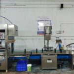 Oil Filling capping and Labelling machine